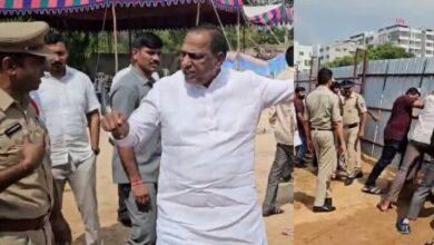 Ch Malla Reddy gets the boundary fence removed from the land with the help of his followers in the presence of police officers who were there to prevent the issue from escalating.