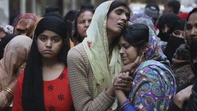Relatives mourn Mohammad Mudasir, 31, who was killed in rioting in Delhi. Photograph: Manish Swarup/AP