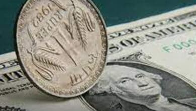 Rupee falls to record low against US dollar