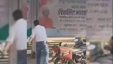 Watch: Man pelts stone at a poster of PM Modi in Maharashtra