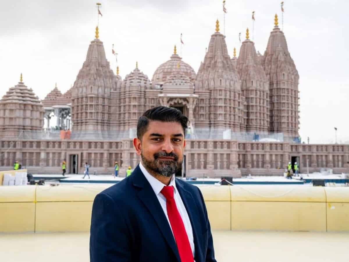 Indian-origin banker quits high-paying job to volunteer at Abu Dhabi BAPS Hindu mandir