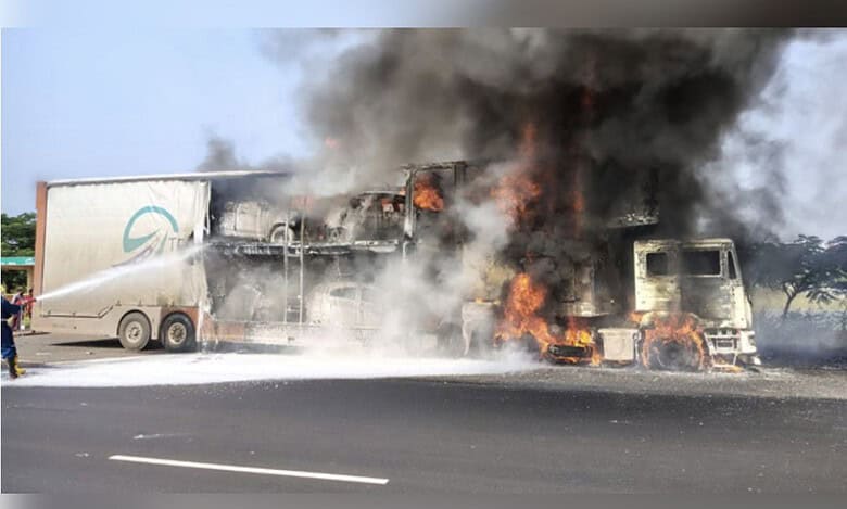 Container lorry carrying 8 cars catches fire on Hyderabad-Mumbai highway