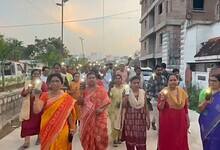 Women participate in a rally for HYDRAA in Manikonda