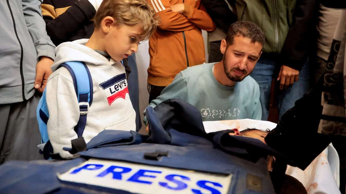 People mourn freelance Palestinian journalist Mahmoud Wadi at Nasser hospital, killed by an Israeli strike on Dec. 2, 2025, in Khan Younis, in the southern Gaza Strip.