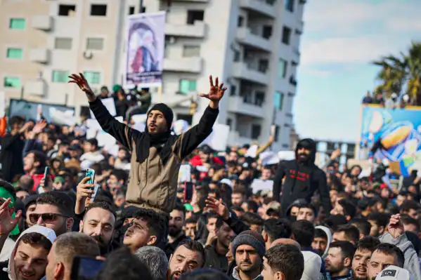 Alawite protesters gather in Latakia after mosque bombing.