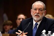 US ambassador speaking at a formal event, expressing a controversial comment on Israel.