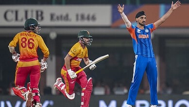 Indian cricketers celebrating a successful play in the T20 World Cup match.