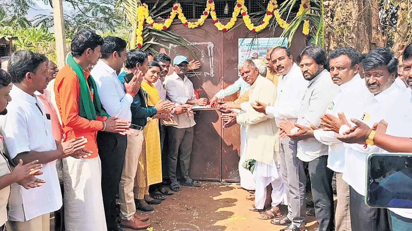 Officials of Karnataka Social Welfare Department inaugurate a barber shop