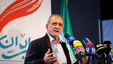 Iranian President Masoud Pezeshkian speaks during a public address in Tehran.