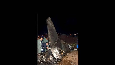 IAF officials at the aircraft crash site in Assam