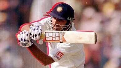 VVS Laxman batting during a cricket match, celebrating his 281 score milestone.
