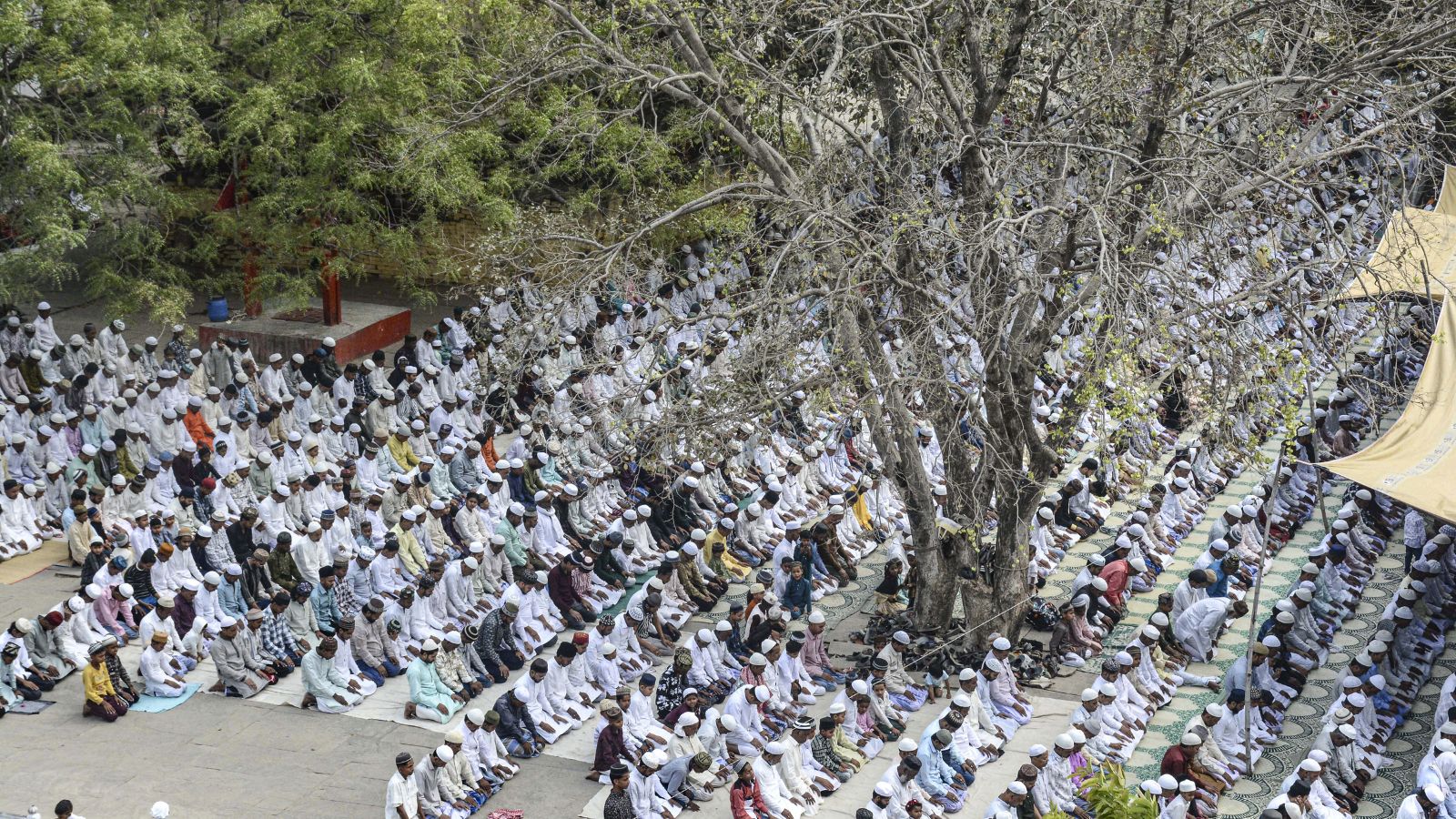 People from the Muslim community offer namaz on the eve of Eid al-Fitr festival, in Varanasi, Friday,