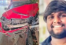Accident scene showing a damaged red car after hitting a man on Durgam Cheruvu cable bridge, driver fleei.