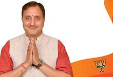 Pravesh Wahi, BJP leader, smiling with folded hands, after being elected MCD mayor, in a celebratory mome.
