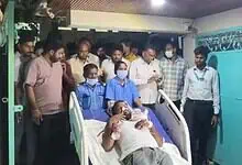 Patient in critical condition receives medical attention at a hospital in Nalgonda amid paddy procurement.