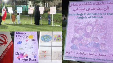 Visitors view children’s drawings at ‘Angels of Minab’ exhibition at Iranian Embassy, New Delh.