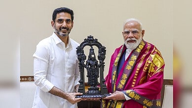 Nara Lokesh with Prime Minister Narendra Modi during TDP event in Andhra Pradesh.