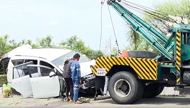 A car being towed after an accident at ORR