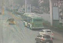 Bus and cars involved in a traffic incident on a rainy day in Kukatpally.