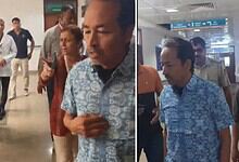 Sonam at hospital, surrounded by staff and visitors, appears distressed and is being stopped by security.