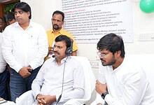 Officials and staff at a helpline launch event for Indiramma houses in Hyderabad.
