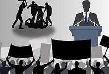 Silhouettes of protesters and a speaker at a rally, highlighting political unrest and public discourse.