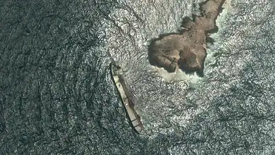 Satellite image of Caroline Bezengi tanker grounded near Qibliyah Island.