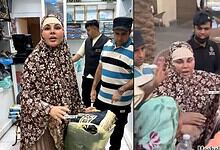 Rakhi Sawant in Makkah distributing jaananamaz, surrounded by fans and media.