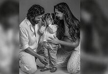 Family with daughter Dua, emotional moment, black and white photo.