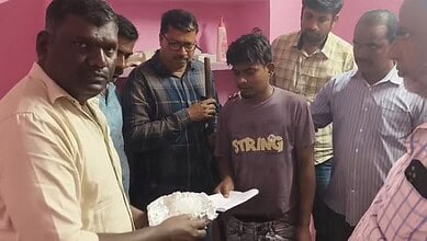 Telangana excise officials with the arrested drug peddler