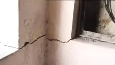 Cracks in the wall of a building in Hyderabad, indicating structural damage.