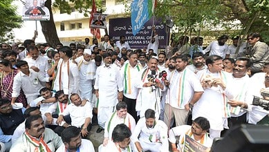 Protesters from Congress and CPI gather during a demonstration against the CEC.
