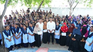 Telangana school toppers and officials at Shriram Group scholarship award ceremony.
