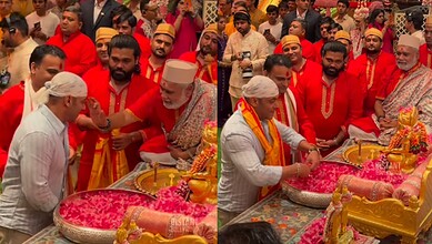 Salman Khan at Ambani's Ganapati celebrations with devotees and priests.