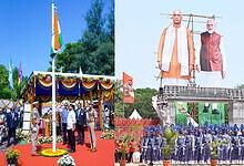 Indian flag hoisted at a public event with officials and soldiers present.