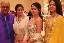 Four people, including Boney Kapoor and two women, dressed in traditional Indian attire at an event.