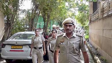 Delhi Police officers patrolling during the Tiranga march in Delhi.