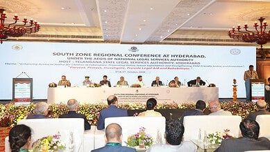 South Zone Regional Conference on legal services in Hyderabad with speakers and audience.