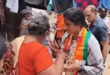 Woman pushes BJP Hyderabad MP candidate during campaigning