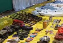 Arms and other items recovered by security personnel during an encounter with naxalites, in Bijapur district, Friday, May 10, 2024. At least 12 naxalites were killed, according to officials. (PTI Photo)