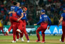 Royal Challengers Bengaluru's Camron Green celebrates with teammates after dismissing Delhi Capitals' Tristan Stubbs through a runout during an Indian Premier League (IPL) 2024 T20 cricket match between Royal Challengers Bengaluru and Delhi Capitals