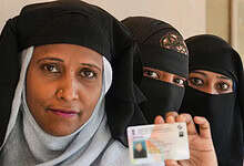 Burqa clad woman at a polling station
