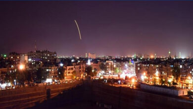 Syrian state media broadcast footage of what it said were its air defences lighting up the night sky
