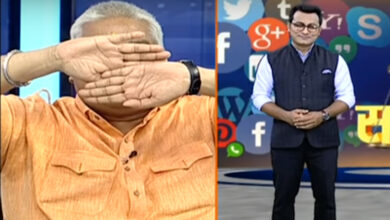 Ajay Gautam covers his eyes after seeing Muslim anchor