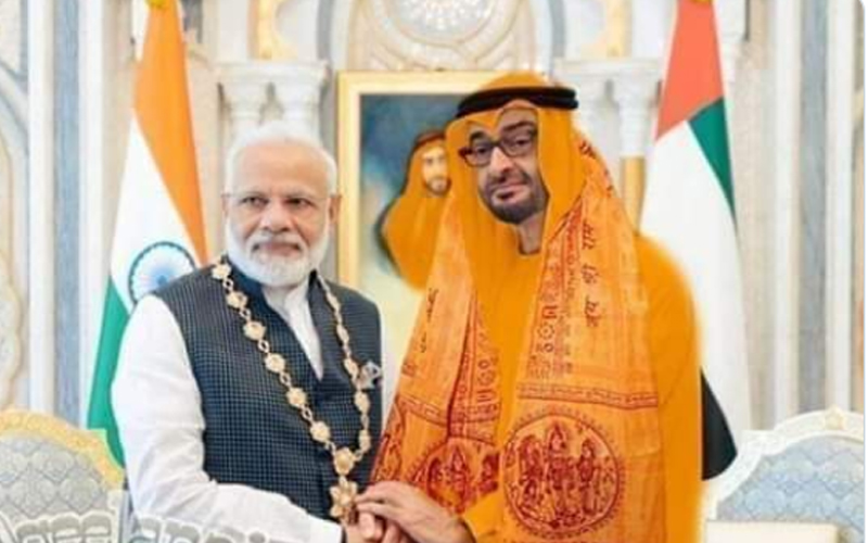 Abu Dhabi Crown Prince in saffron robes