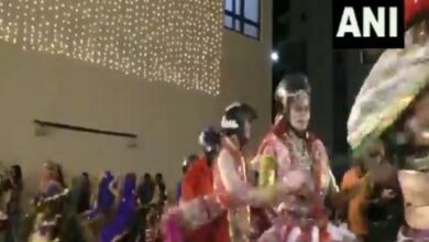Dance group performs Garba wearing helmets to create road safety awareness