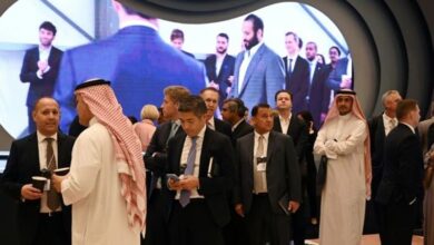 Saudi 'Davos in desert': Glitz, smiles, hidden name cards