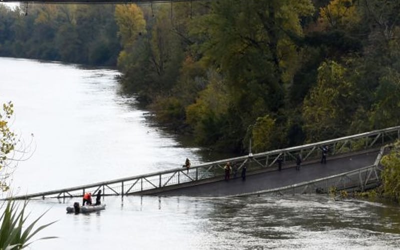 Girl dies, several feared missing in French bridge collapse
