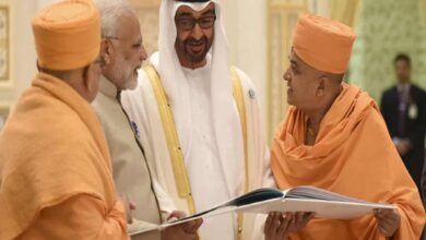 Crown Prince HH Mohamed bin Zayed al Nahyan and PM Narendra Modi are shown a book outlining the temple project Image Courtesy: BASP.Org