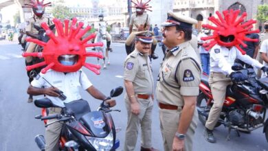 Cops wear coronavirus helmets to persuade people to stay home